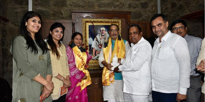 MP Wakchaure honoring guests at recognition ceremony