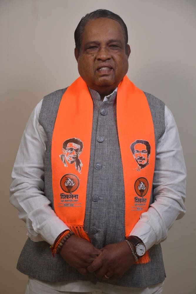 Portrait of MP Wakchaure wearing party stole